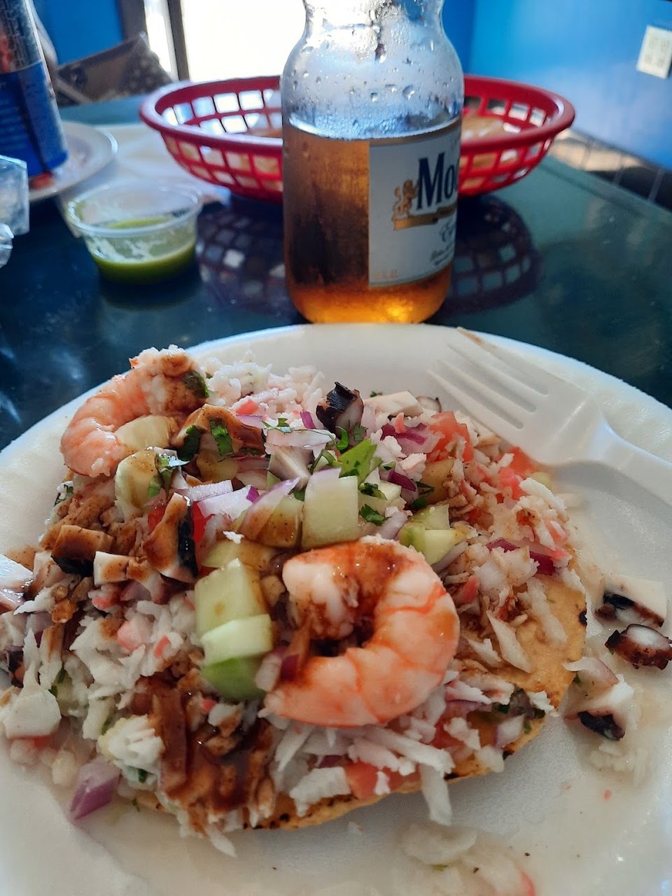 Restaurant menu with kids' options and seafood plates.