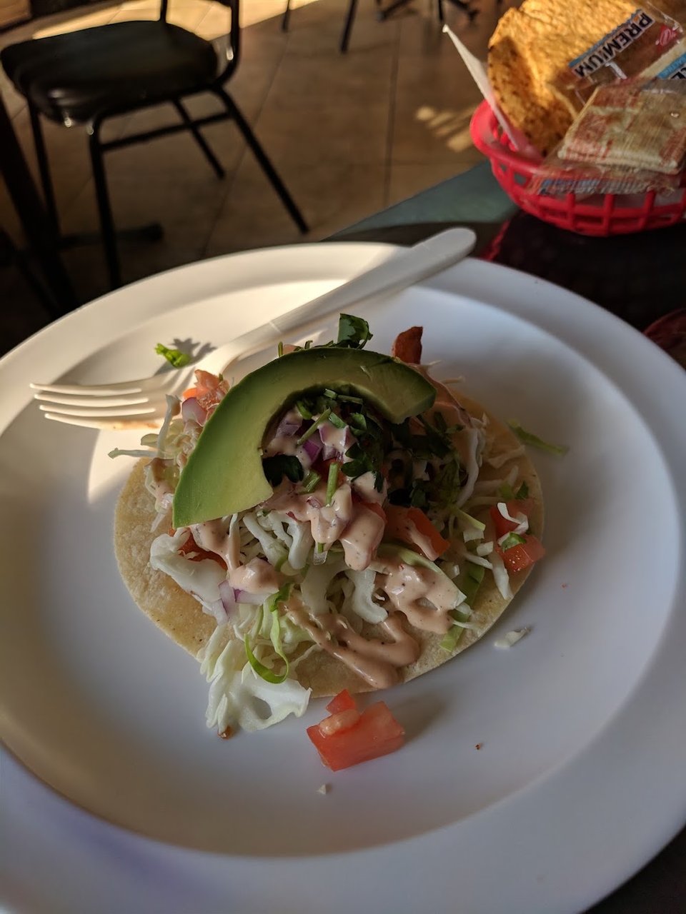 Restaurant menu with kids' options and seafood plates.