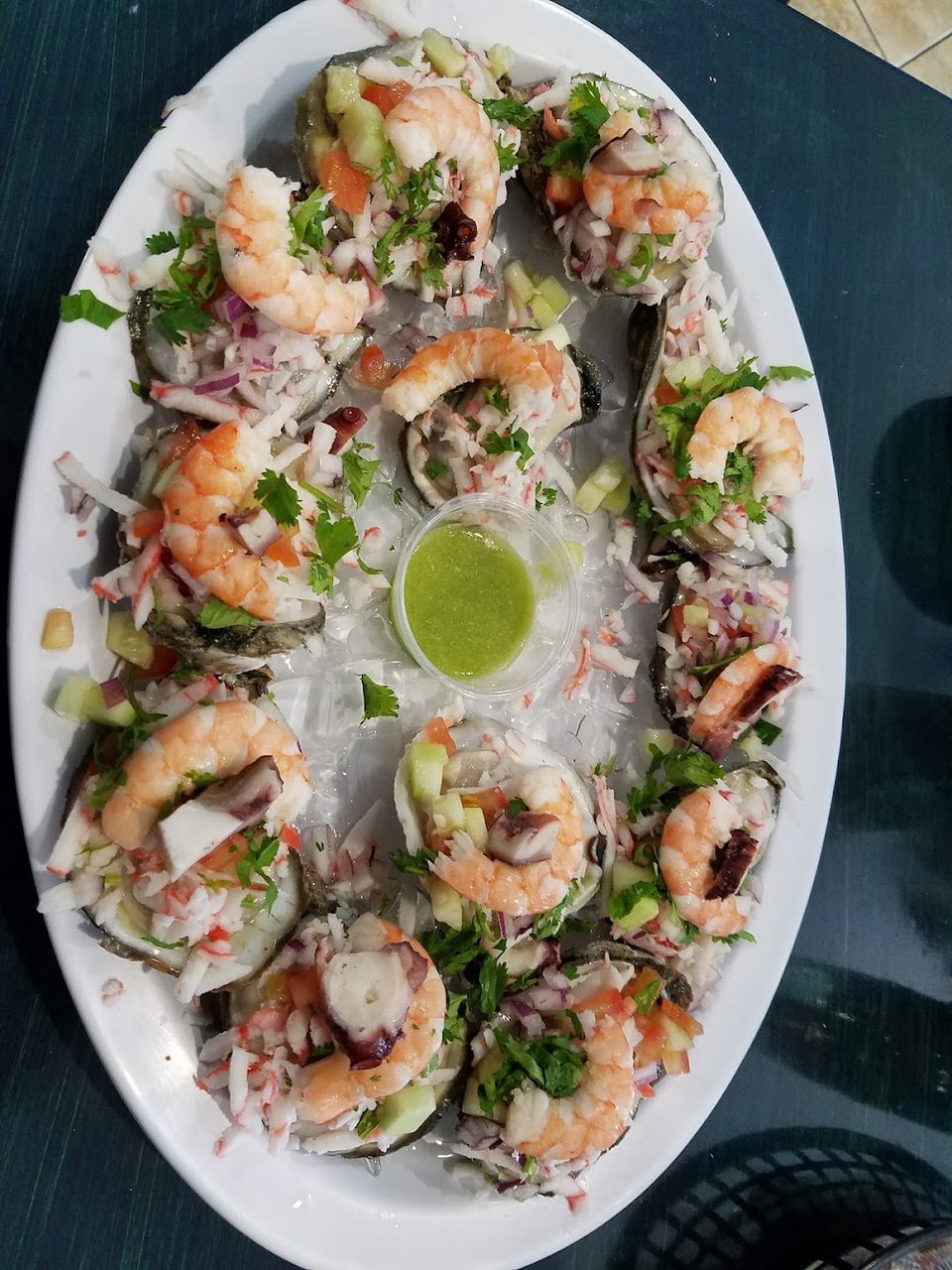 Menu page listing shrimp, fish, and ceviche dishes.