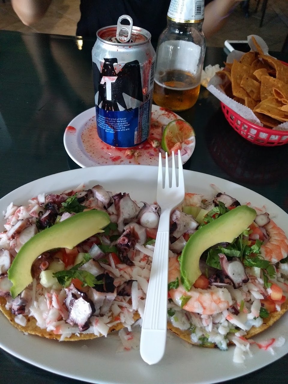Restaurant menu with kids' options and seafood plates.
